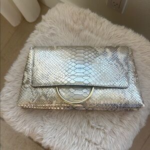 Henri Bendel Elegant Silver Snakeskin Clutch